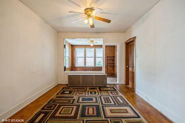 2109 N Long Ave, Chicago, IL 60639 - unfurnished dining area featuring wood finished floors, ceiling fan, and baseboards