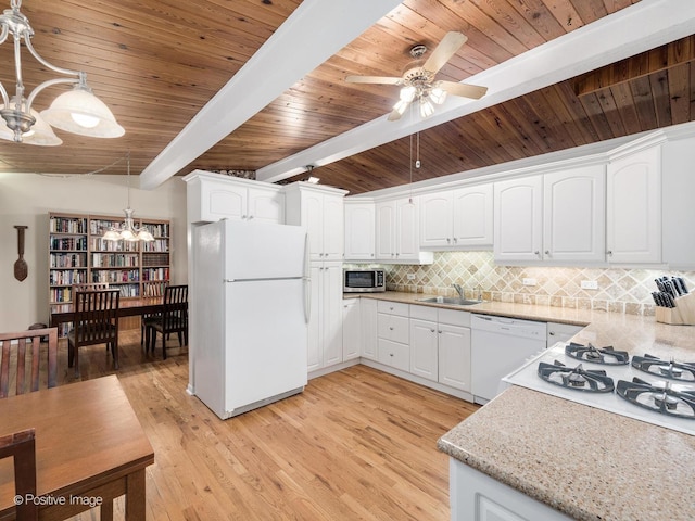 3843 Lizette Ln, Glenview, IL 60026 - kitchen featuring white appliances, a chandelier, a sink, tasteful backsplash, and light wood-style flooring