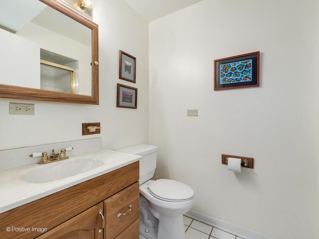 3843 Lizette Ln, Glenview, IL 60026 - full bath featuring tile patterned floors, toilet, vanity, baseboards, and an enclosed shower
