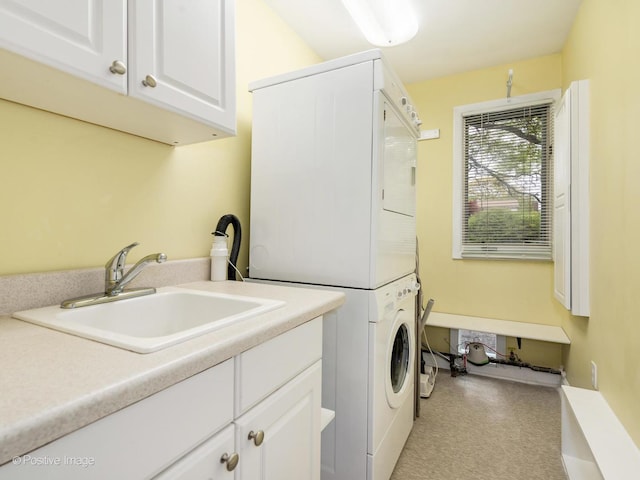 3843 Lizette Ln, Glenview, IL 60026 - laundry area featuring estacked washer and dryer and cabinet space
