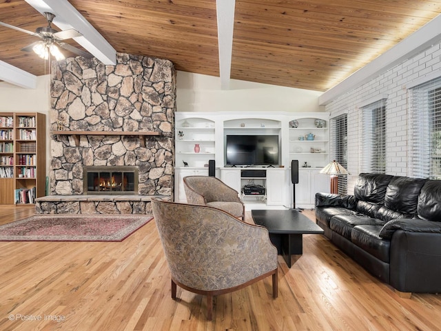 3843 Lizette Ln, Glenview, IL 60026 - living area with a stone fireplace, a ceiling fan, wooden ceiling, and wood finished floors