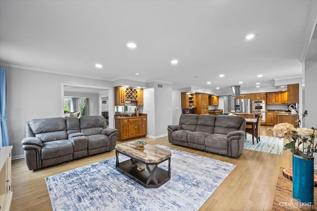 440 Cranesbill Dr, West Chicago, IL 60185 - living room featuring recessed lighting, light wood finished floors, ornamental molding, and baseboards