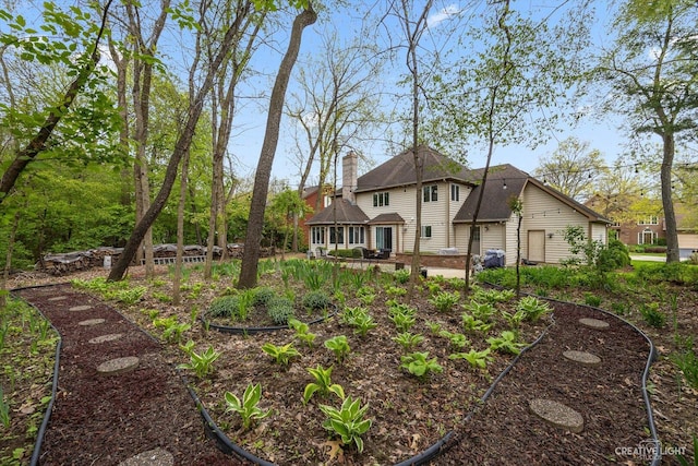 440 Cranesbill Dr, West Chicago, IL 60185 - rear view of house with a chimney