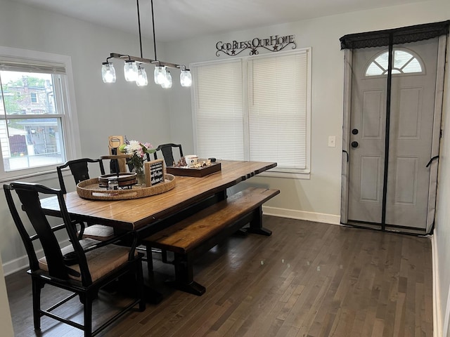 6036 S Loomis Blvd, Chicago, IL 60636 - dining space featuring dark wood-type flooring and baseboards