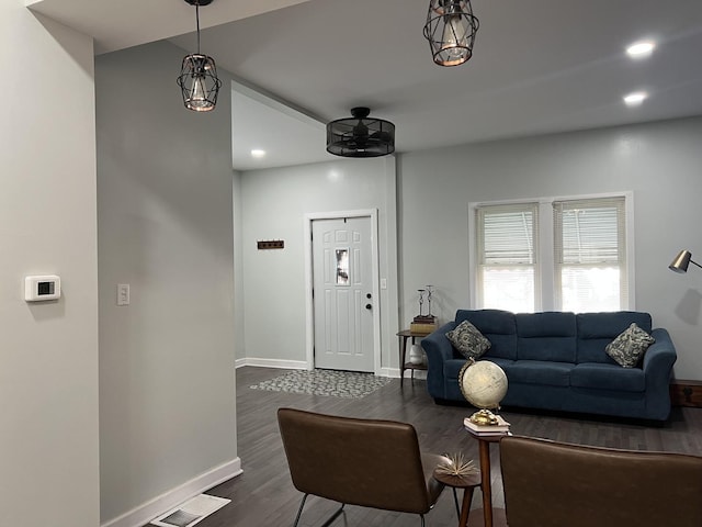6036 S Loomis Blvd, Chicago, IL 60636 - living area featuring dark wood-style flooring, baseboards, and recessed lighting