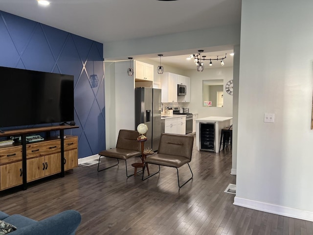 6036 S Loomis Blvd, Chicago, IL 60636 - living room with wine cooler, baseboards, dark wood-type flooring, and a chandelier