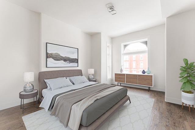 3216 W Walnut St, Chicago, IL 60624 - bedroom featuring wood finished floors and baseboards