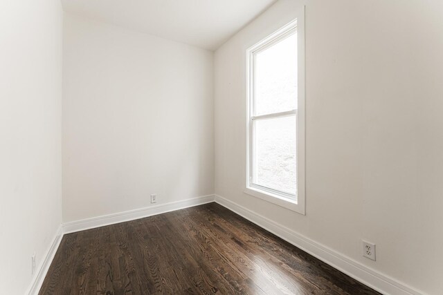 3216 W Walnut St, Chicago, IL 60624 - unfurnished room featuring dark wood finished floors and baseboards