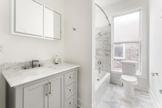 3216 W Walnut St, Chicago, IL 60624 - bathroom featuring marble look tile flooring, vanity, toilet, washtub / shower combination, and baseboards