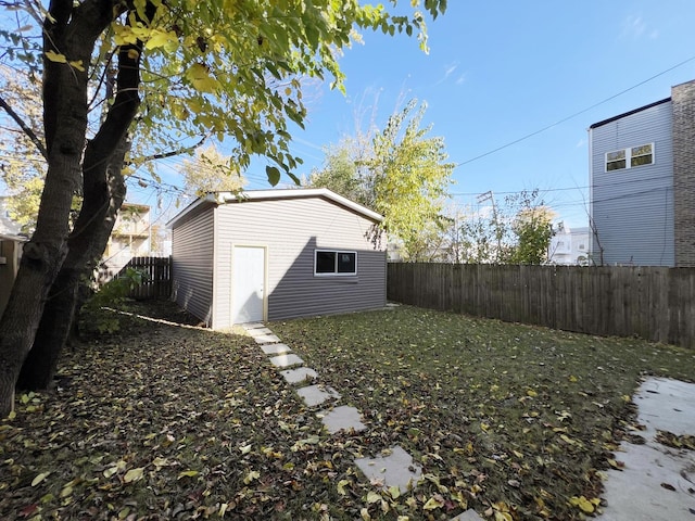 3216 W Walnut St, Chicago, IL 60624 - fenced backyard featuring an outbuilding