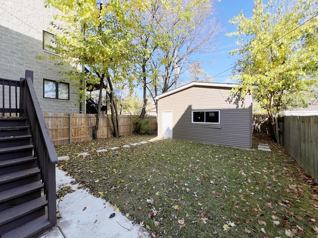 3216 W Walnut St, Chicago, IL 60624 - view of yard featuring stairs and an outbuilding
