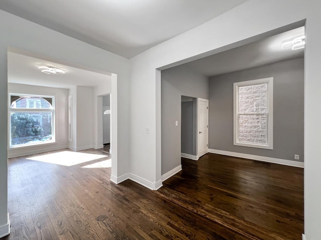 3216 W Walnut St, Chicago, IL 60624 - unfurnished room with dark wood-style flooring and baseboards