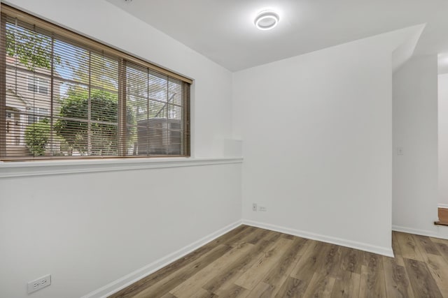 1544 Sauganash Ct, Gurnee, IL 60031 - unfurnished room with wood finished floors and baseboards