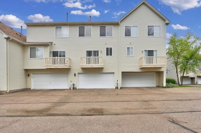 1544 Sauganash Ct, Gurnee, IL 60031 - rear view of property with a garage and driveway