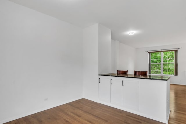 1544 Sauganash Ct, Gurnee, IL 60031 - empty room featuring dark wood-style flooring and baseboards
