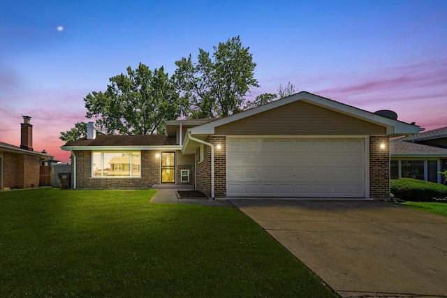 4113 176th Pl, Country Club Hills, IL 60478 - view of front of home featuring brick siding, concrete driveway, an attached garage, a front yard, and a chimney