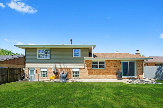 4113 176th Pl, Country Club Hills, IL 60478 - rear view of house featuring brick siding, a patio area, a chimney, and cooling unit