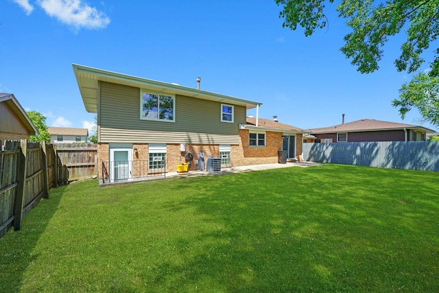 4113 176th Pl, Country Club Hills, IL 60478 - rear view of house with a patio, brick siding, and central AC unit
