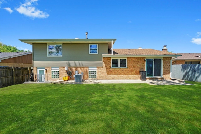 4113 176th Pl, Country Club Hills, IL 60478 - back of property with brick siding, a patio, a chimney, and central air condition unit