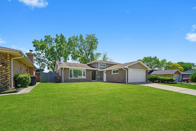 4113 176th Pl, Country Club Hills, IL 60478 - split level home featuring an attached garage, driveway, brick siding, and a chimney