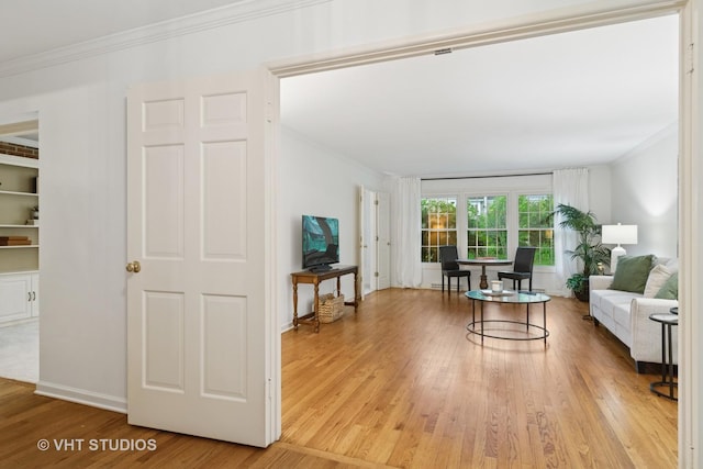 1116 W Mallard Dr, Palatine, IL 60067 - living area featuring wood finished floors, ornamental molding, and baseboards