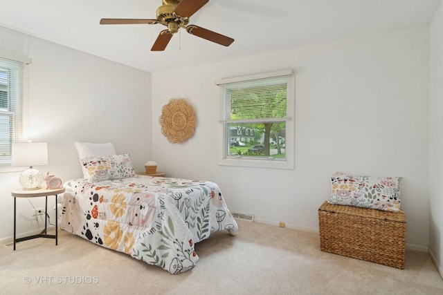 1116 W Mallard Dr, Palatine, IL 60067 - carpeted bedroom with baseboards and a ceiling fan