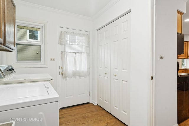 1116 W Mallard Dr, Palatine, IL 60067 - laundry area with cabinet space, separate washer and dryer, light wood finished floors, and crown molding