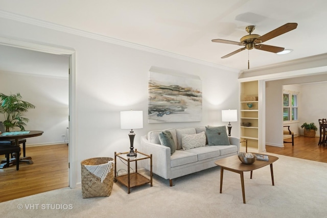 1116 W Mallard Dr, Palatine, IL 60067 - living area featuring crown molding, wood finished floors, ceiling fan, and baseboards