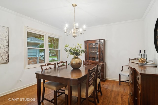 1116 W Mallard Dr, Palatine, IL 60067 - dining space with a chandelier, ornamental molding, wood finished floors, and baseboards