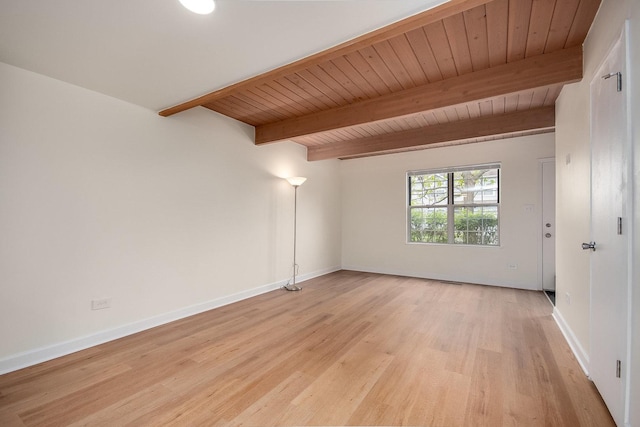 1991 Westview Ln, Round Lake Beach, IL 60073 - unfurnished room with light wood-style floors, baseboards, and wooden ceiling with exposed beams