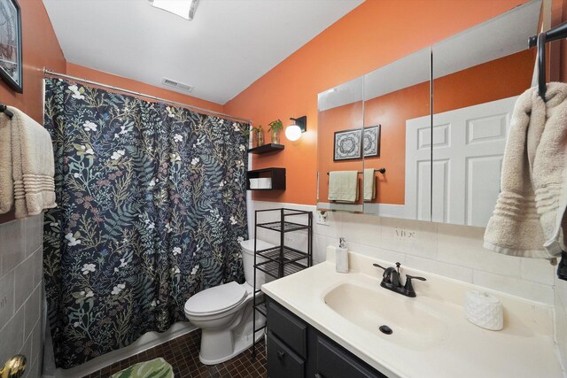 3713 W Palmer St Unit 2, Chicago, IL 60647 - full bath with toilet, vanity, tile walls, tile patterned flooring, and a shower with shower curtain