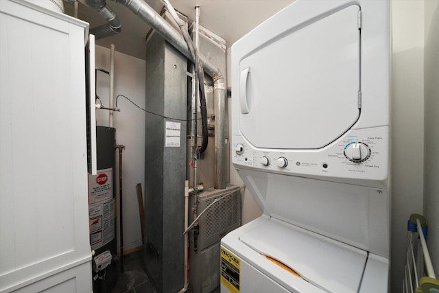 3713 W Palmer St Unit 2, Chicago, IL 60647 - washroom featuring stacked washer / dryer and water heater