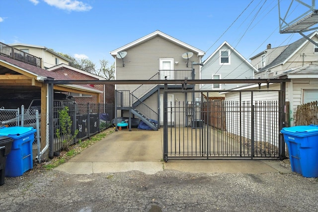 3713 W Palmer St Unit 2, Chicago, IL 60647 - view of front of property with a fenced front yard, a gate, and stairway