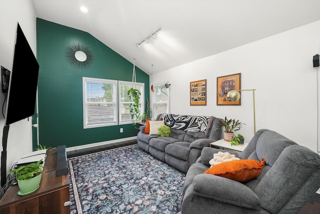 3713 W Palmer St Unit 2, Chicago, IL 60647 - living area featuring wood finished floors, lofted ceiling, rail lighting, and baseboards