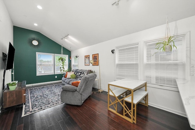 3713 W Palmer St Unit 2, Chicago, IL 60647 - living room featuring vaulted ceiling, rail lighting, wood finished floors, baseboards, and recessed lighting