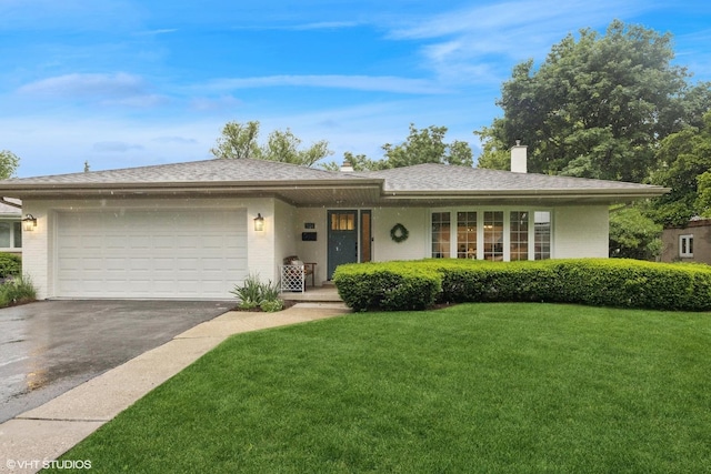 5104 Johnson Ave, Western Springs, IL 60558 - view of front facade with brick siding, a front lawn, driveway, an attached garage, and a chimney