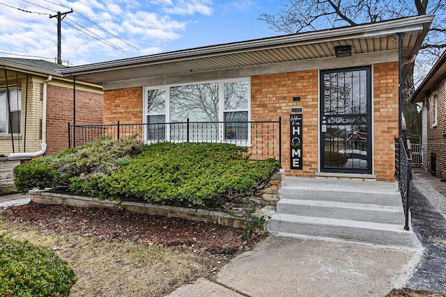 8040 S Lafayette Ave, Chicago, IL 60620 - view of exterior entry featuring brick siding