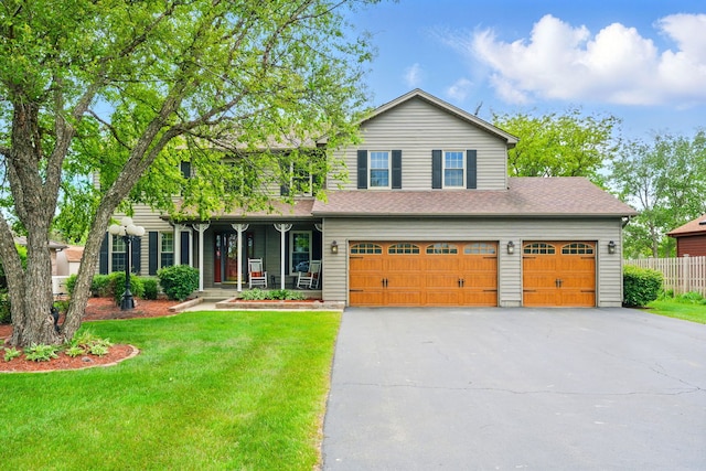 47W041 Briarwood Ln, Hampshire, IL 60140 - view of front of property with asphalt driveway, a porch, a garage, and roof with shingles
