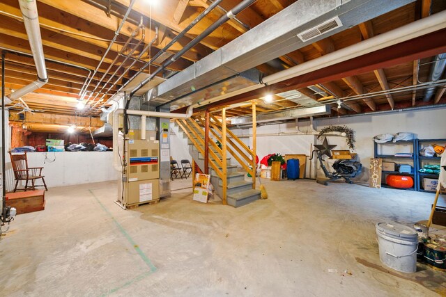 47W041 Briarwood Ln, Hampshire, IL 60140 - unfinished below grade area featuring stairway and heating unit