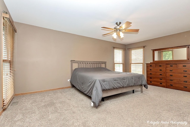 12401 Bigelow Ave, Hebron, IL 60034 - carpeted bedroom with baseboards and ceiling fan