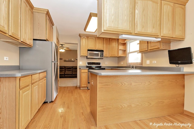 12401 Bigelow Ave, Hebron, IL 60034 - kitchen featuring stainless steel appliances, light brown cabinets, light wood-style floors, a ceiling fan, and a sink