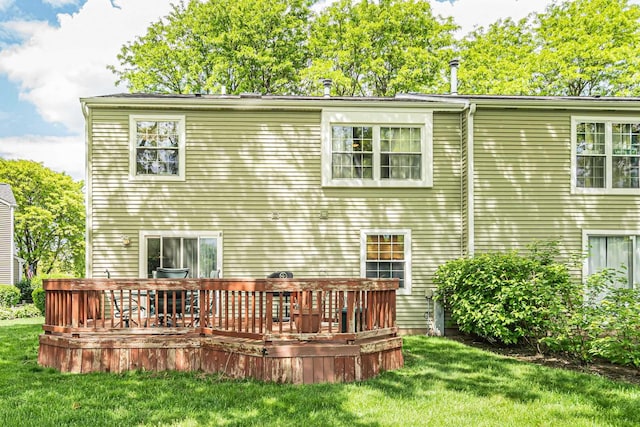 1911 Ozark Pkwy, Algonquin, IL 60102 - rear view of house with a yard and a wooden deck