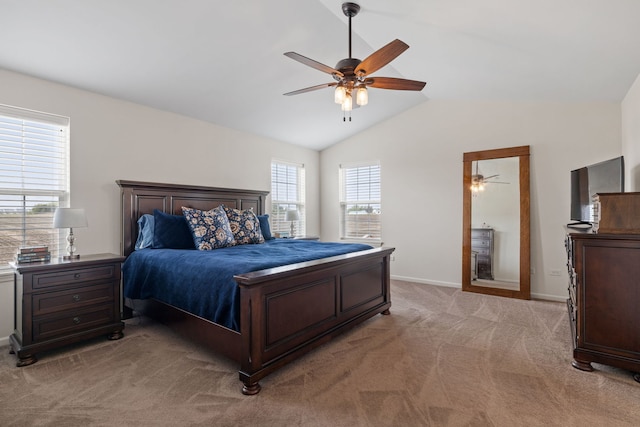 12414 Dublin Ln, Plainfield, IL 60585 - bedroom with light carpet, multiple windows, vaulted ceiling, baseboards, and a ceiling fan