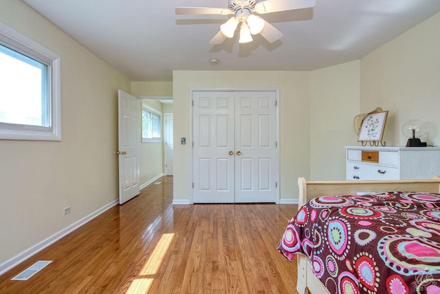 28671 Moose Range Rd, Sycamore, IL 60178 - bedroom featuring light wood finished floors, baseboards, a closet, and ceiling fan