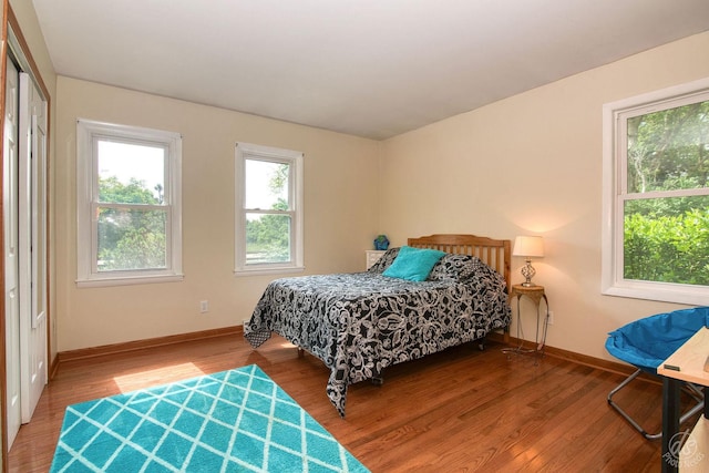 28671 Moose Range Rd, Sycamore, IL 60178 - bedroom featuring baseboards and wood finished floors