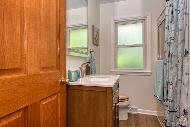 28671 Moose Range Rd, Sycamore, IL 60178 - full bathroom featuring toilet, vanity, wood finished floors, baseboards, and a shower with curtain