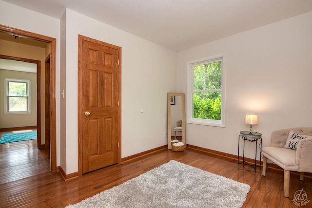 28671 Moose Range Rd, Sycamore, IL 60178 - sitting room featuring baseboards and wood finished floors