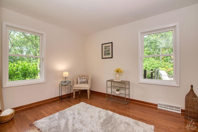 28671 Moose Range Rd, Sycamore, IL 60178 - sitting room featuring plenty of natural light, baseboards, and wood finished floors