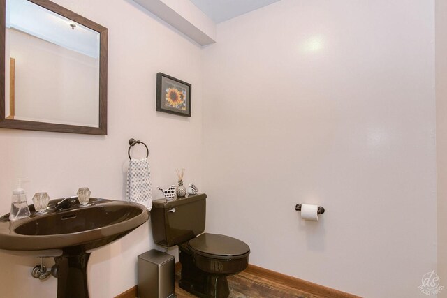 28671 Moose Range Rd, Sycamore, IL 60178 - bathroom featuring toilet, wood finished floors, and baseboards