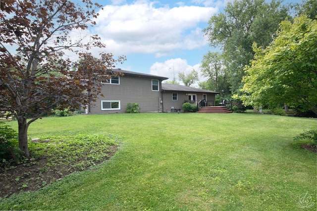 28671 Moose Range Rd, Sycamore, IL 60178 - view of green lawn featuring a deck